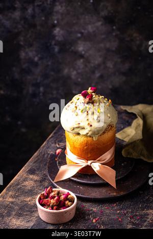 Traditional Easter cake kulich with pistachio Stock Photo