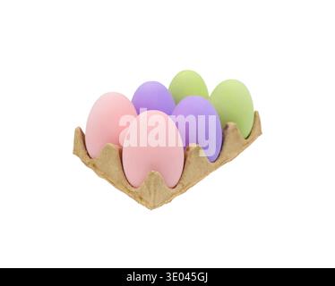 Six pastel-colored eggs in a cardboard egg carton arranged neatly on a white background, showcasing a variety of soft hues for seasonal decoration Stock Photo