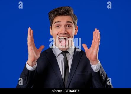 Mature Businessman Showing Invisible Abstract Subject Or Object Sizes Big Large Stock Photo