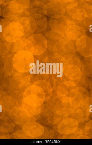 An artistic display of abstract lights that mimic falling raindrops illuminated by the warm glow of a sunset, creating a serene and ethereal visual ex Stock Photo
