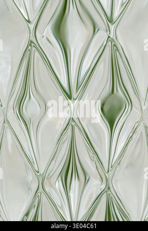 Glass vase photographed against a green background Stock Photo