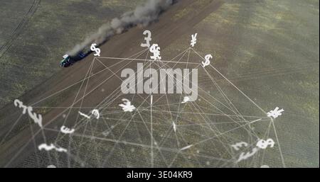 Hovering white currency network floating above stubbled field, showing tractor on diagonal track Stock Photo