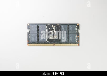 High-resolution image of a DDR5 RAM stick with visible chips and gold contacts, isolated on white for tech and electronics themes Stock Photo