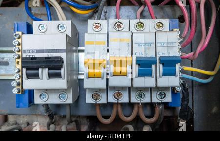 Fuses in the electrical distribution board. Electrical accessories. Electrical topics. Distribution board with fuses or circuit breakers in an apartme Stock Photo
