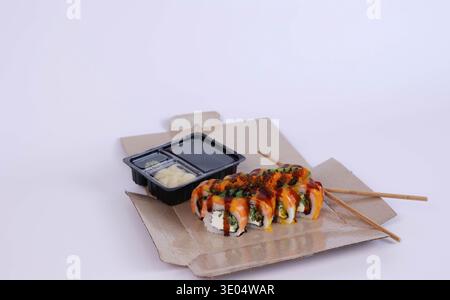 sushi delivery box with soy sauce Stock Photo