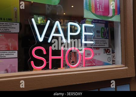 Dublin, Ireland - 10th March 2026: A neon window sign for a Vape Shop in Dublin city centre Stock Photo