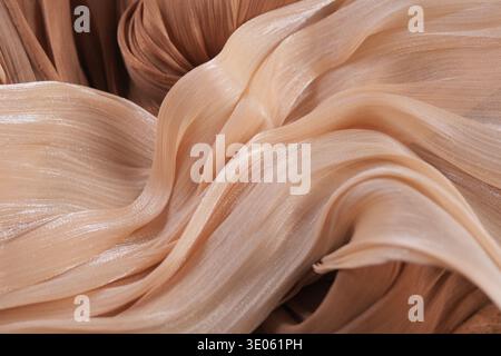 Light fabric waves in soft tones on a neutral background Stock Photo
