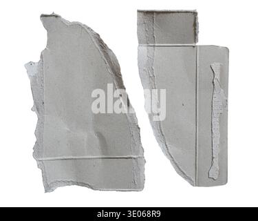 Two Triangle Shaped Grey Hard Paper Pieces Torn from Box Packaging isolated on white background with clipping path Stock Photo