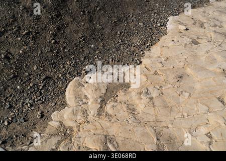 Geological Contrast of Black Sand and White Stone at Cape Inamuragasaki, Kamakura, Japan Stock Photo