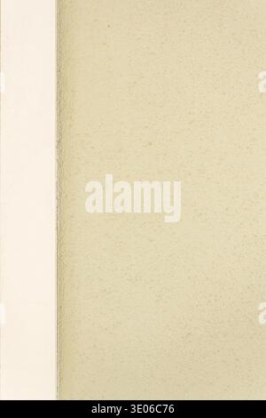 Beige textured plaster wall with white architectural edge minimal background Stock Photo