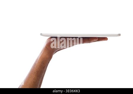 Black man holding digital tablet isolated on white background Stock Photo