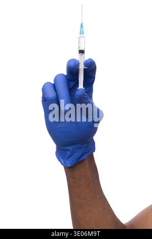Black male hand in blue glove holding a plastic syringe Stock Photo