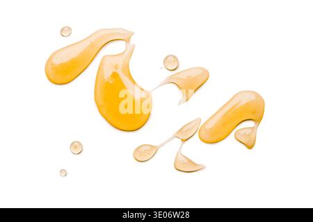 Liquid honey isolated on white background Stock Photo