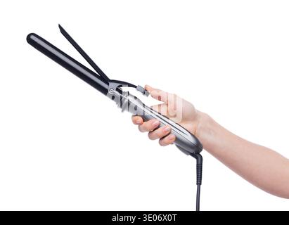 Female hand holding curling iron isolated on white Stock Photo