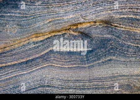 Blue rock stone material with weathered texture. Close up blue color natural stone textured surface. Organic beautiful stone texture photo. Natural im Stock Photo