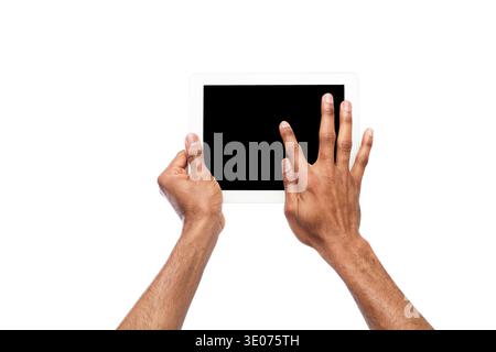 Holding and pointing on blank screen on tablet Stock Photo