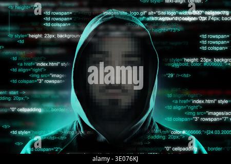 Hacker or cybercriminal and programming code. Digital security Stock Photo