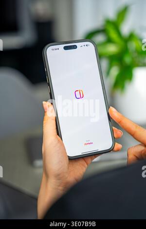 Prague, Czech Republic - February 19, 2026: Close up of woman hands holding smartphone with Edits video editing app open on screen. Mobile content Stock Photo