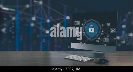 Mail server security and encrypted email network concept desktop monitor with shield lock of data center servers, email cybersecurity protection. Stock Photo