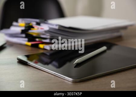 Stacked paperwork on office desk, document analysis, compliance review, Analyze document plans workflow Document review concept Stock Photo