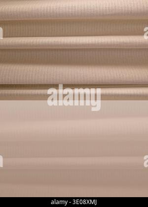 Neutral Beige Curtains With Soft Light And Vertical Folds Stock Photo