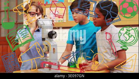 Examining three schoolboys leaning over microscope at classroom table, with red flask, green beaker Stock Photo