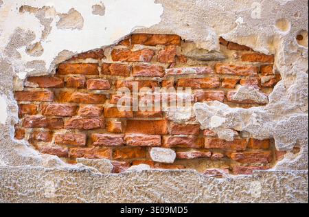 Stone wall of a building in the countryside of Tuscany Stock Photo