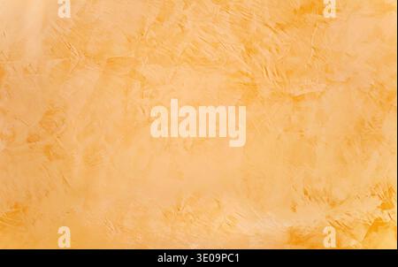 Background of a wall with beige Venetian plaster Stock Photo