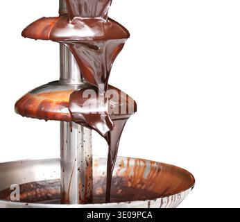 Stell chocolate fountain on white background for parties Stock Photo