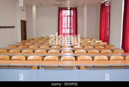 Empty classroom with wood chairs Stock Photo