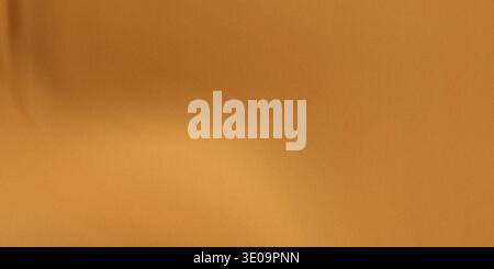 This image features a warm golden brown leather texture with a smooth gradient effect, showcasing a subtle sheen and soft folds. Stock Photo