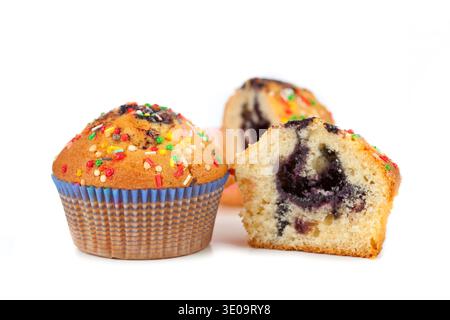 Sweet muffins on white background Stock Photo