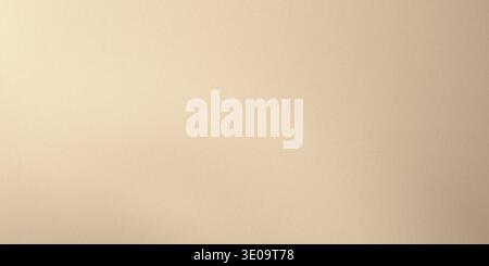 A close-up view of a brown cardboard texture with a rough surface, showing its natural fibers and earthy tone, with a slight gradient effect Stock Photo