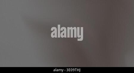 Detailed view of a dark gray surface exhibiting a fine, consistent texture. This image serves as an excellent abstract background, offering depth and Stock Photo