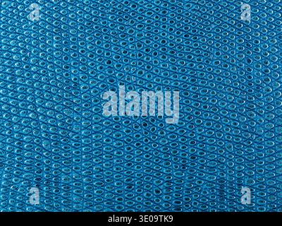 Abstract texture of synthetic leather, blue snake macro background. Stock Photo