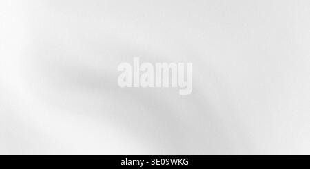 A detailed view of a gray fabric with smooth folds, showcasing its texture and subtle sheen, isolated on a pure white background. Stock Photo