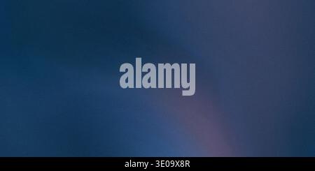 A dark blue background with a subtle purple hue and gradient effect, creating a sense of depth and dimensionality, with a rich and vibrant color tone. Stock Photo