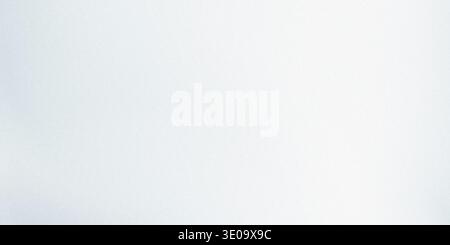 A light grey background with a subtle texture and a predominantly white tone, creating a clean and minimalist feel, with a smooth and even surface. Stock Photo