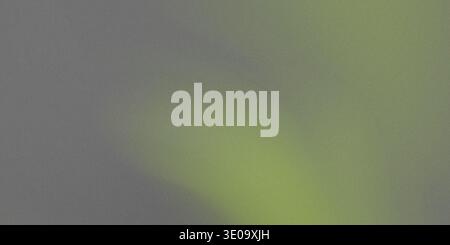 An abstract image showcasing a grainy, textured surface dominated by gray tones, highlighted by an irregular patch of bright, neon yellow-green light Stock Photo