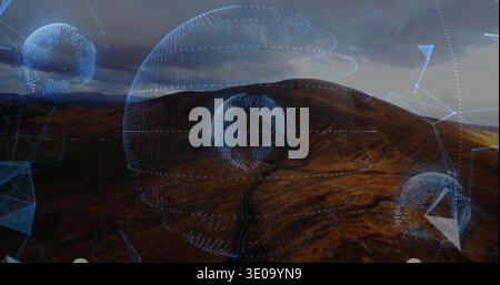 Hovering central dotted globe over moorland valley, projecting rings and network lines by road Stock Photo