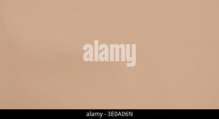 A brown textured background with a rough, sandpaper-like surface, set against a clean and crisp white background for clear visibility. Stock Photo