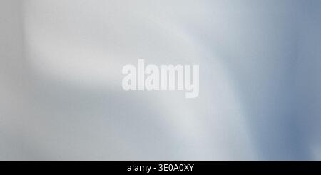 This image showcases a soft blue and white gradient background with smooth transitions between colors, creating a calming and serene atmosphere. Stock Photo