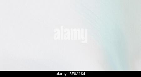 This image showcases a white and blue gradient background with a soft texture, creating a calming and serene visual effect. The gradient transitions s Stock Photo