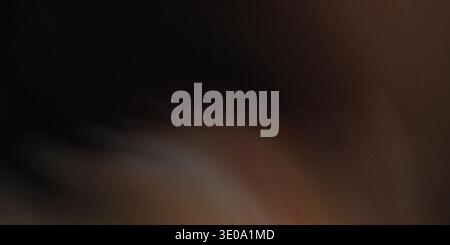 A dark brown gradient background with mysterious shadows and highlights, creating a sense of depth and intrigue, perfect for adding drama and contrast Stock Photo