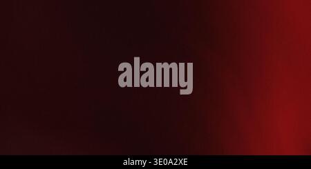 A dark red gradient background with a subtle texture, transitioning from deep red to black, creating a rich and vibrant visual effect. Stock Photo
