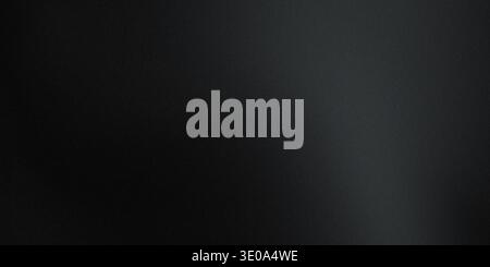 A dark background with a subtle gradient effect and a light reflection on the right side, creating a sense of depth and dimension. Stock Photo