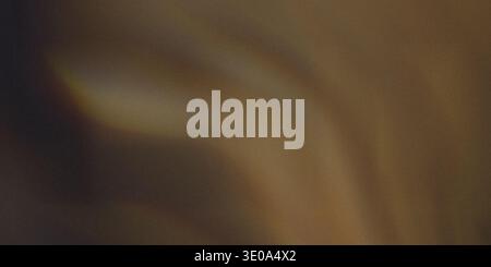 This image displays a brown fabric with a smooth surface. The fabric has gentle folds and creases, giving it a natural look. The brown color is rich a Stock Photo