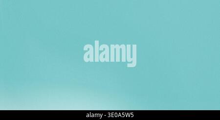 A close-up view of a textured surface in a vibrant teal or aqua blue color, featuring a subtle gradient that brightens towards the bottom center, crea Stock Photo