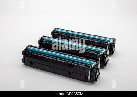 Three empty toner cartridges, for color laser printers, white background, symbol image, disposing of toner cartridges, Stock Photo