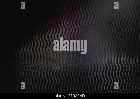 A dark, abstract image featuring a prominent vertical wavy or corrugated texture. There are faint hints of color, possibly red and purple, visible thr Stock Photo